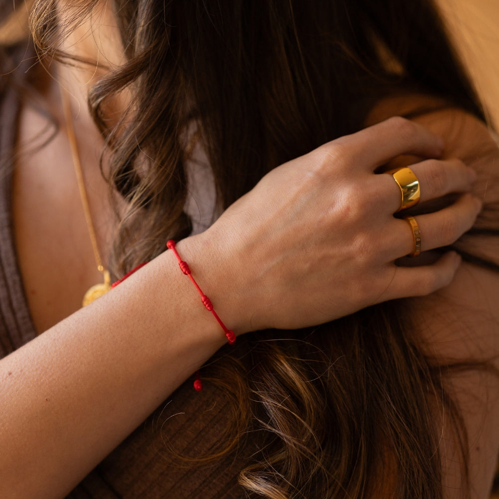 Red bracelet with 7 knots hotsell